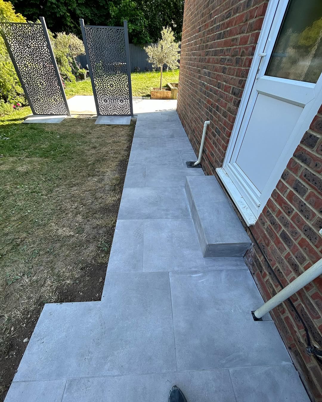 Porcelain paving alongside a house, Epsom