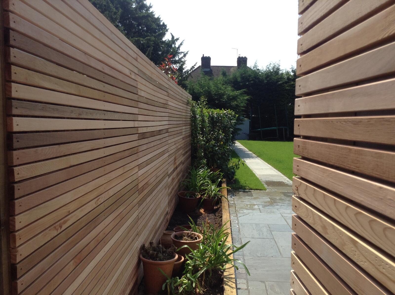 Garden path with new fencing in Surrey