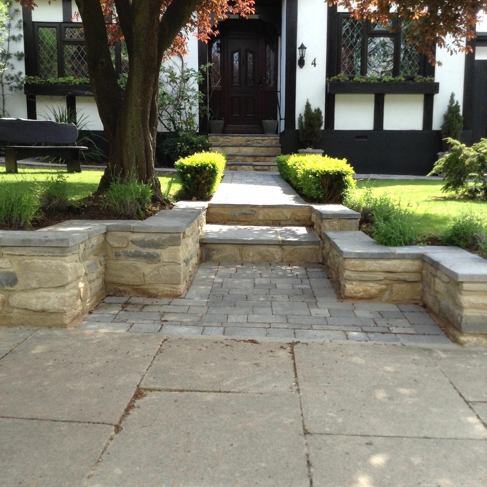Landscaped garden with patio and pergola in Surrey