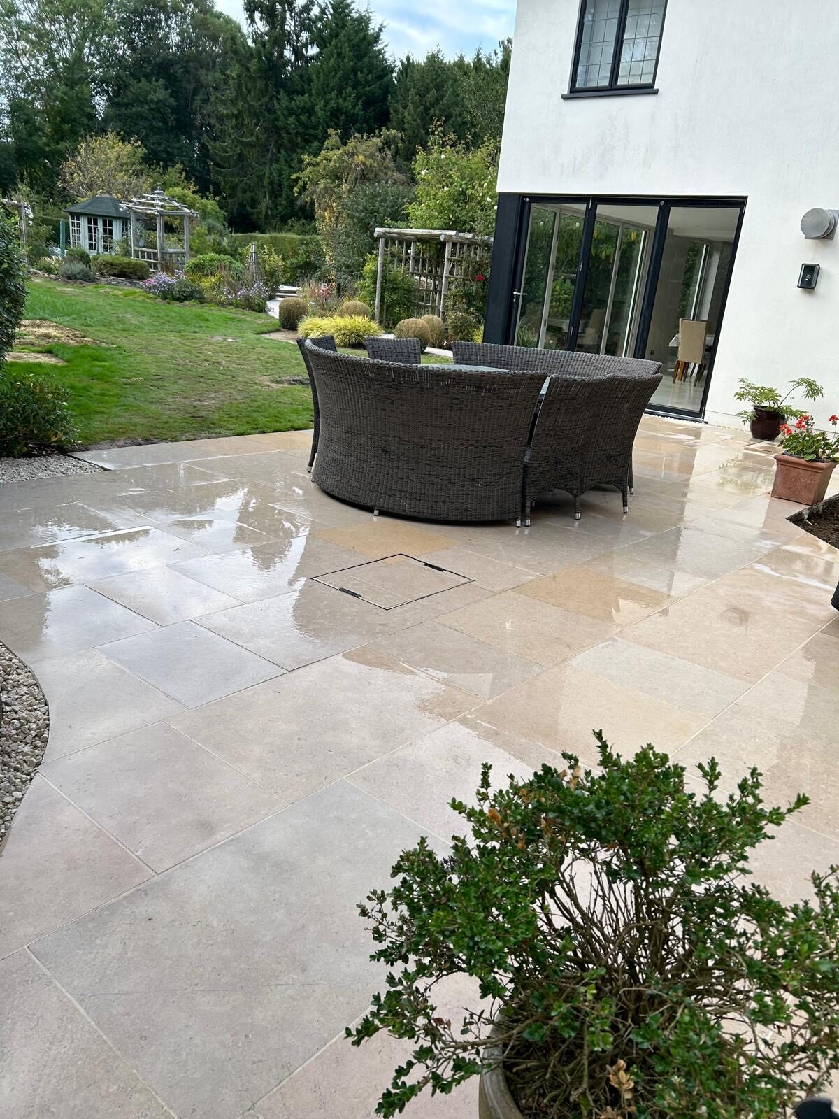Porcelain patio with garden and planting in Surrey