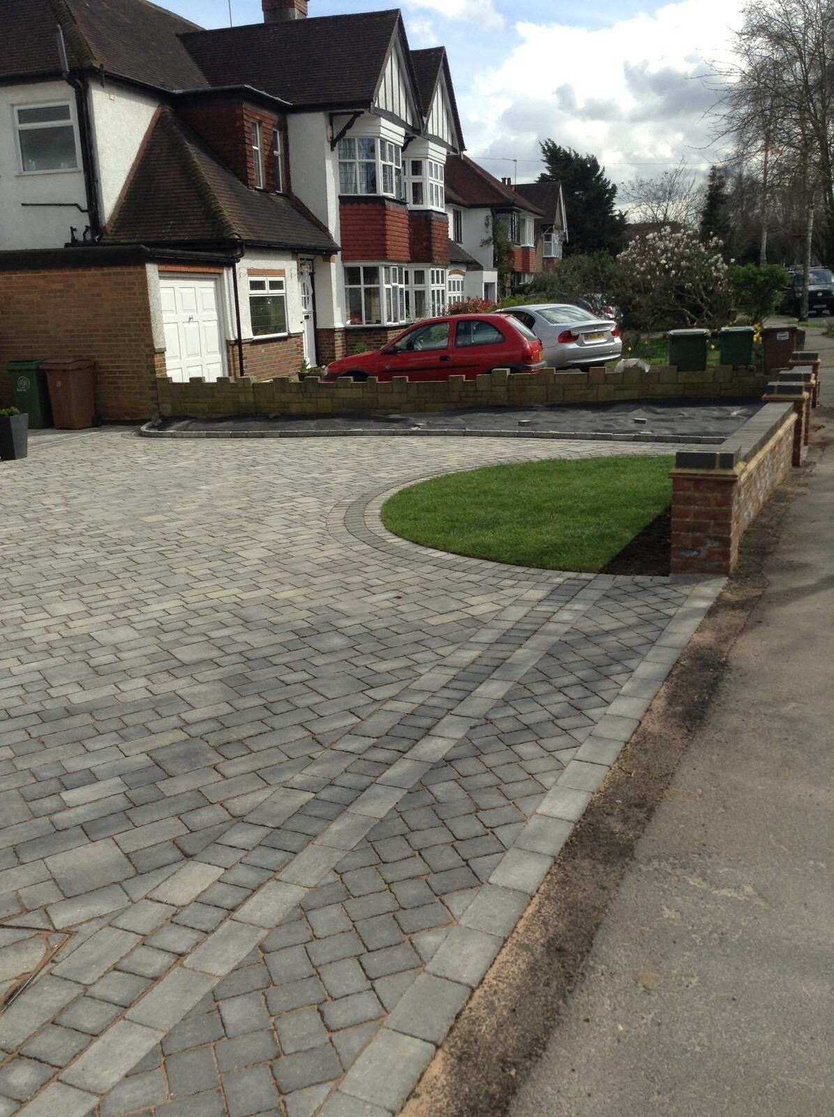 Red herringbone block paving driveway in Surrey