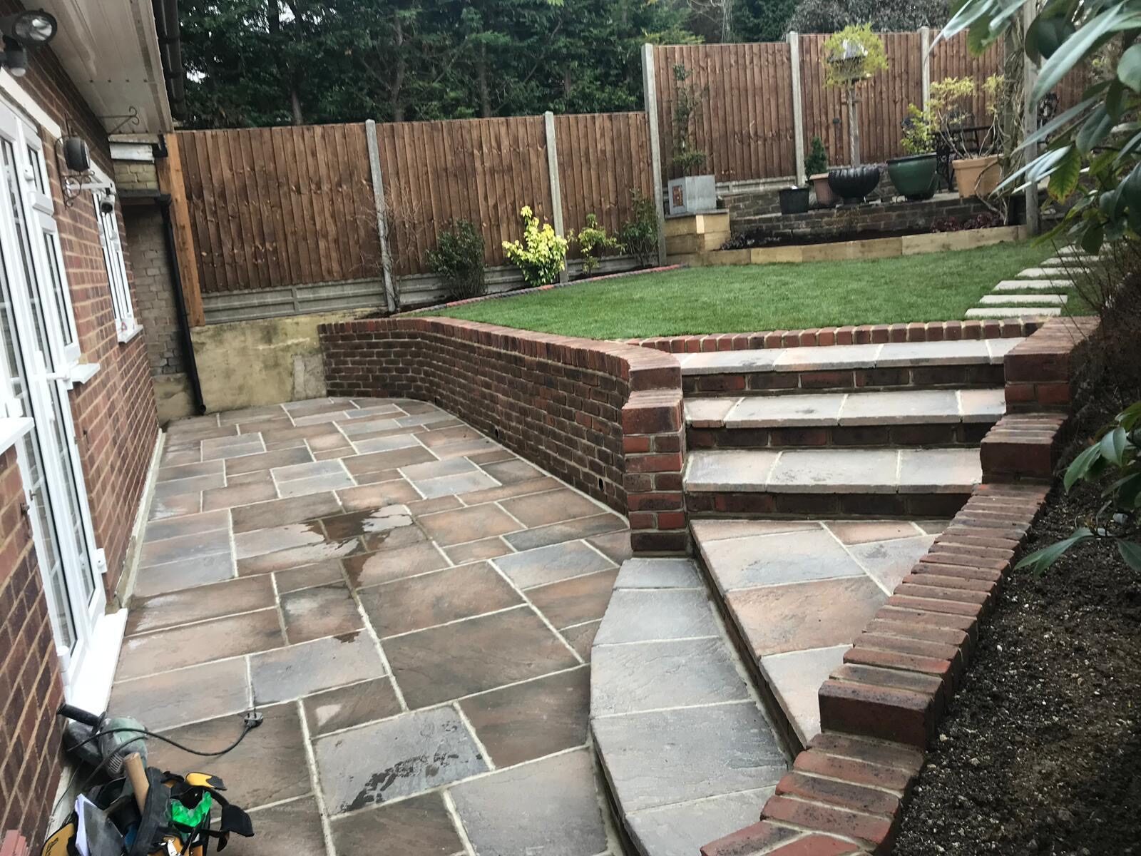 Sandstone patio with steps in Surrey