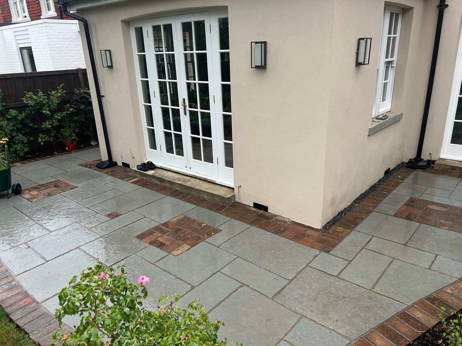 Sandstone patio with steps in Surrey